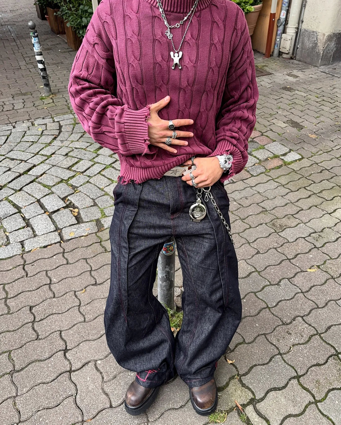 THE DISTRESSED CABLE KNIT SWEATER