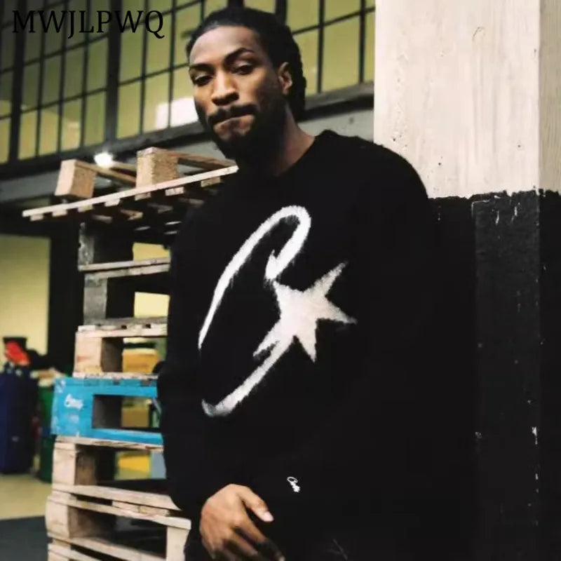 THE COSMIC "C" SWEATER