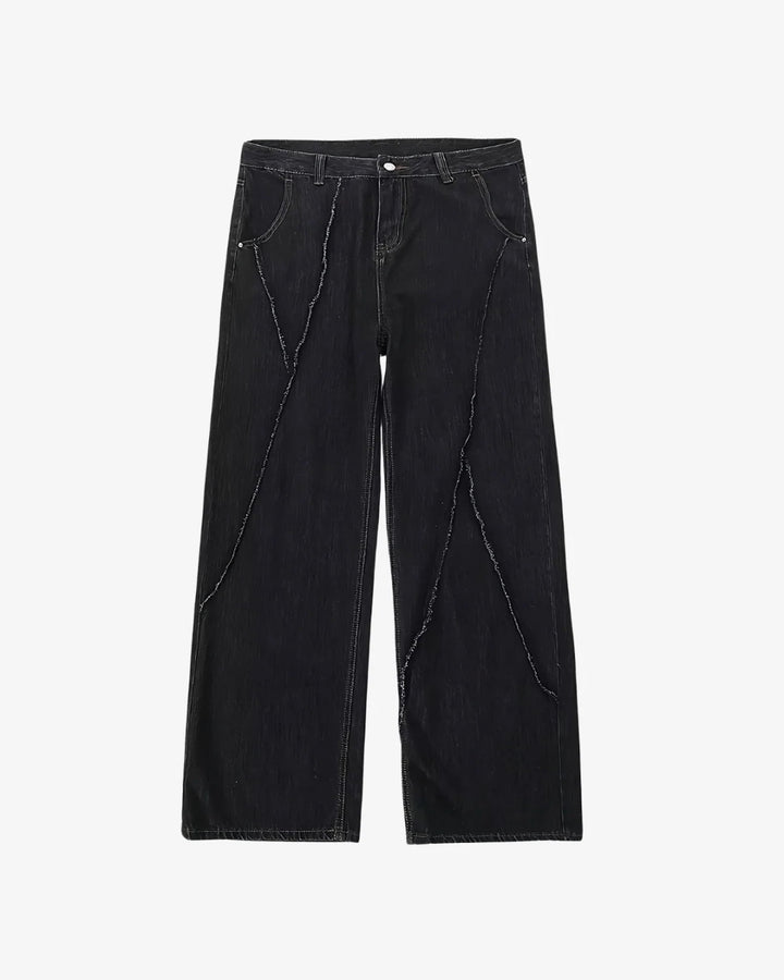 THE DISTRESSED BLACK JEANS